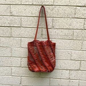 Beautiful woven NWOT Fossil purse